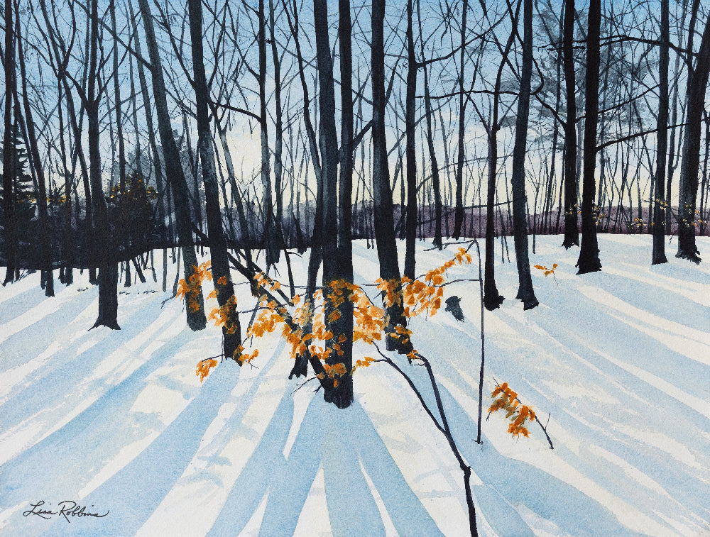 Winter landscape with snow-covered ground and bare trees, featuring a small bush with yellow leaves.